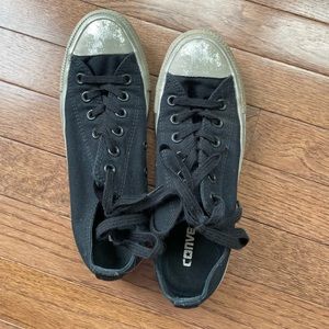 Black and silver distressed converse